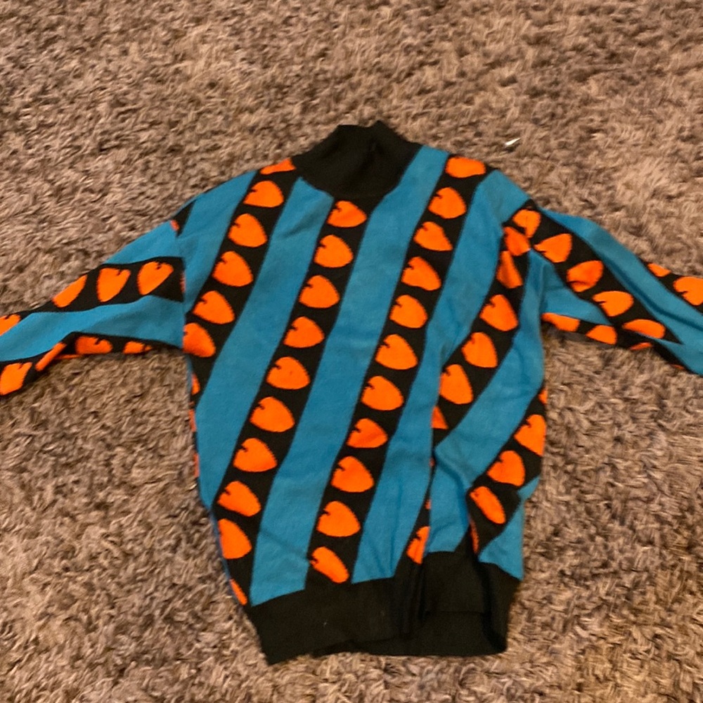 red black and blue sweater